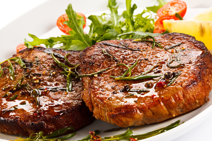 Grilled steaks and vegetables